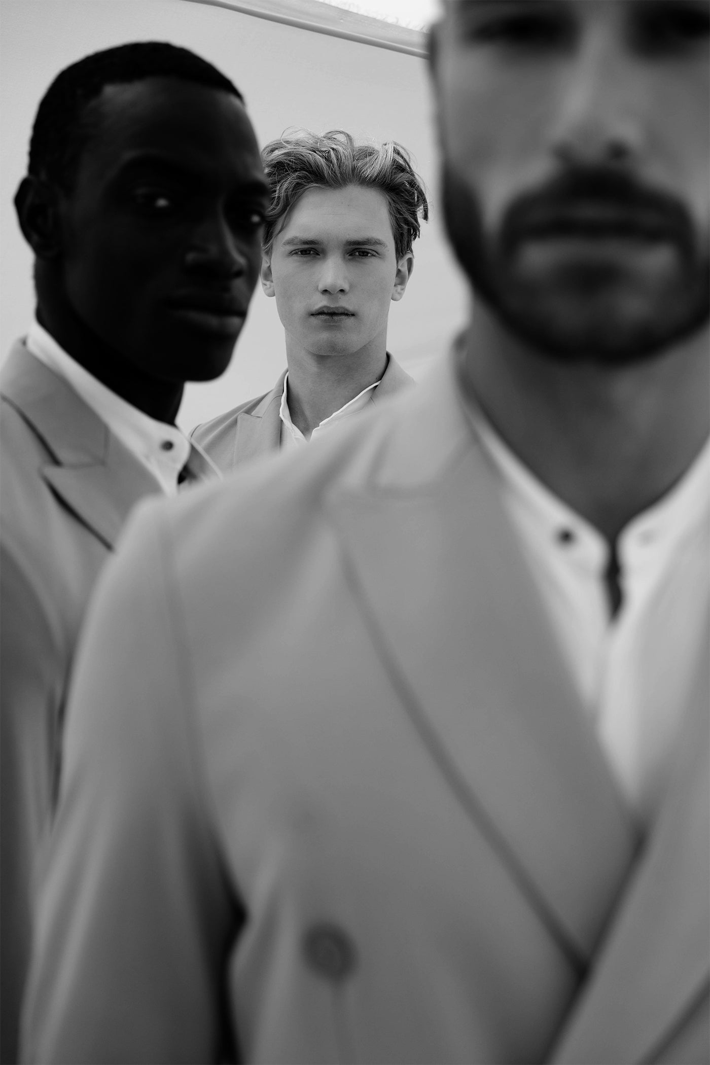cover image black and white with boys for rewards page distretto12 menswear